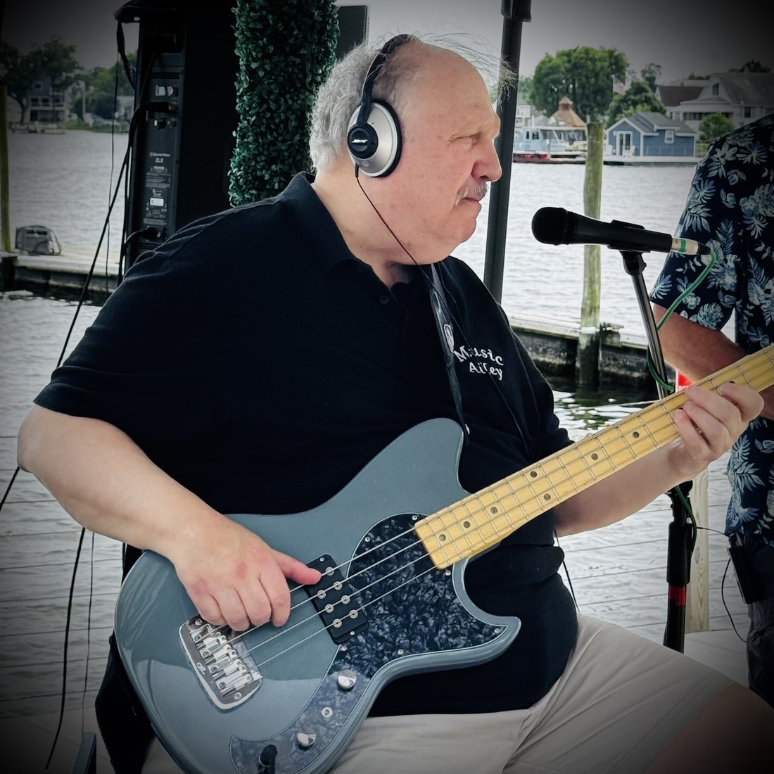 Jim playing bass with Music Alley