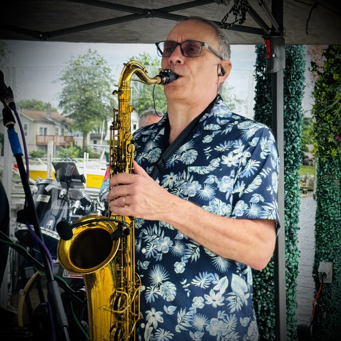 John playing saxophone with Music Alley