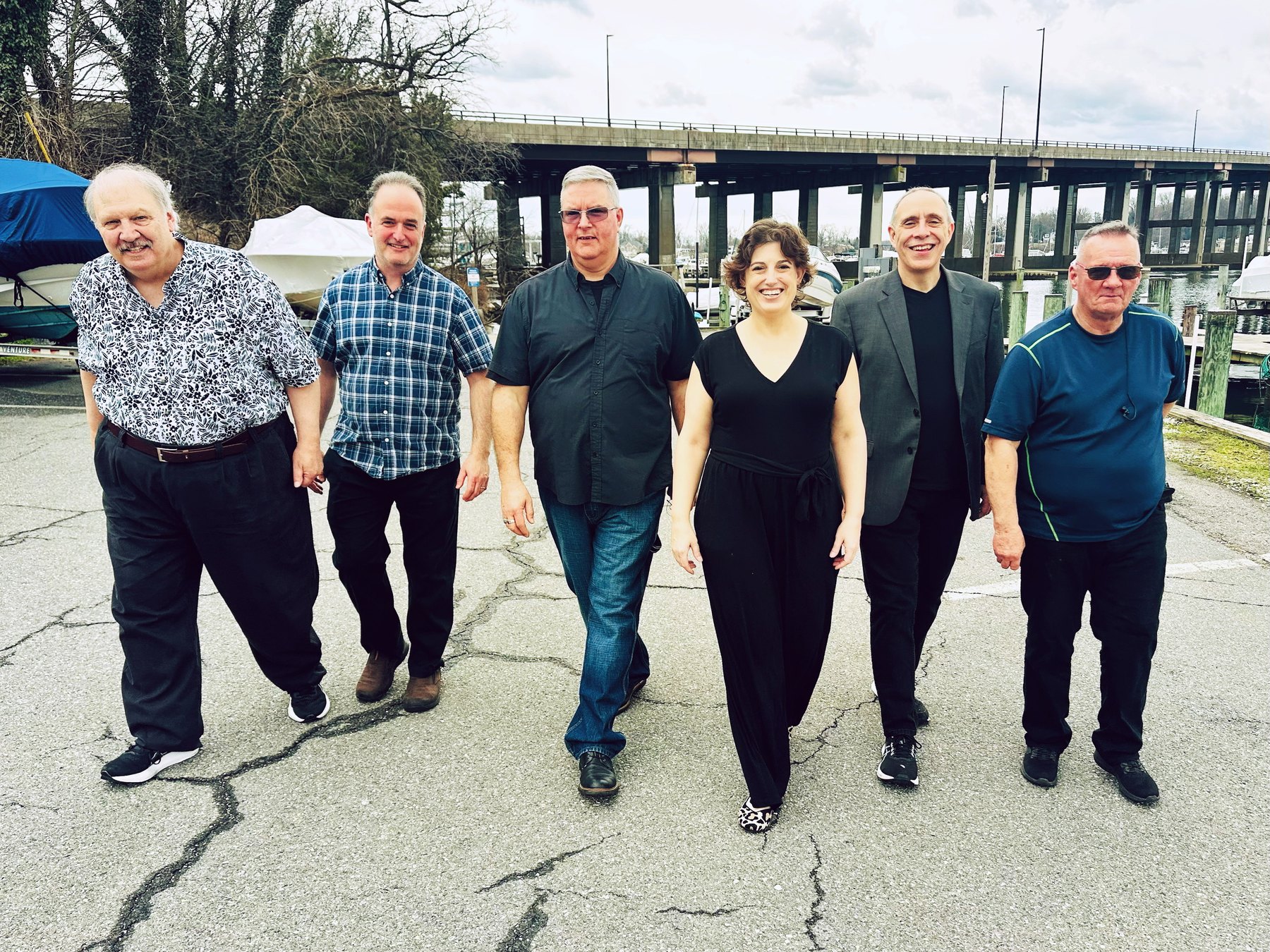 Music Alley band members walking together outdoors
